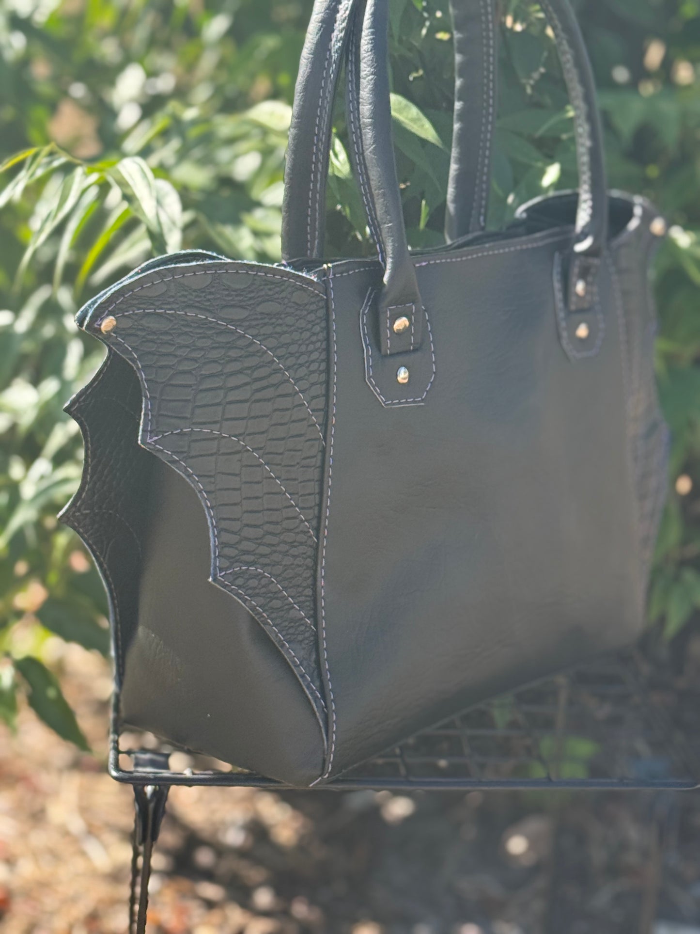 Winged Rudeneja Handbag