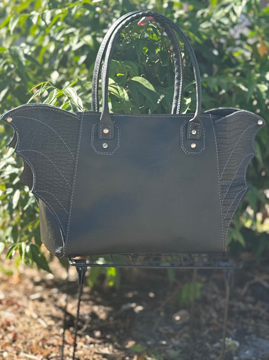 Winged Rudeneja Handbag